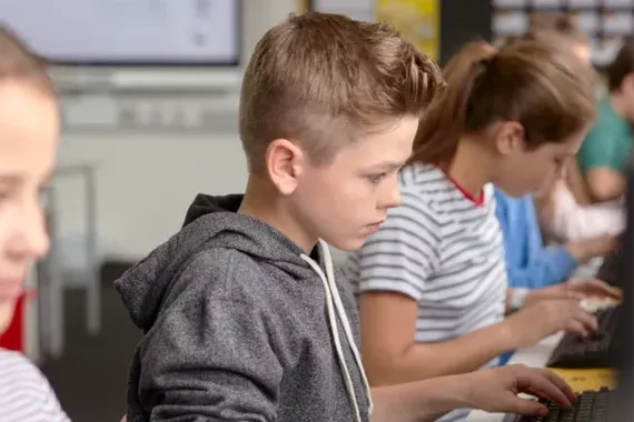 kid in classroom e1770042953126